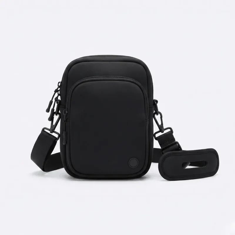 Compact black crossbody bag with shoulder strap